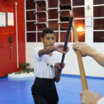 Treino de luta combinada com bastões no Shaolin do Norte